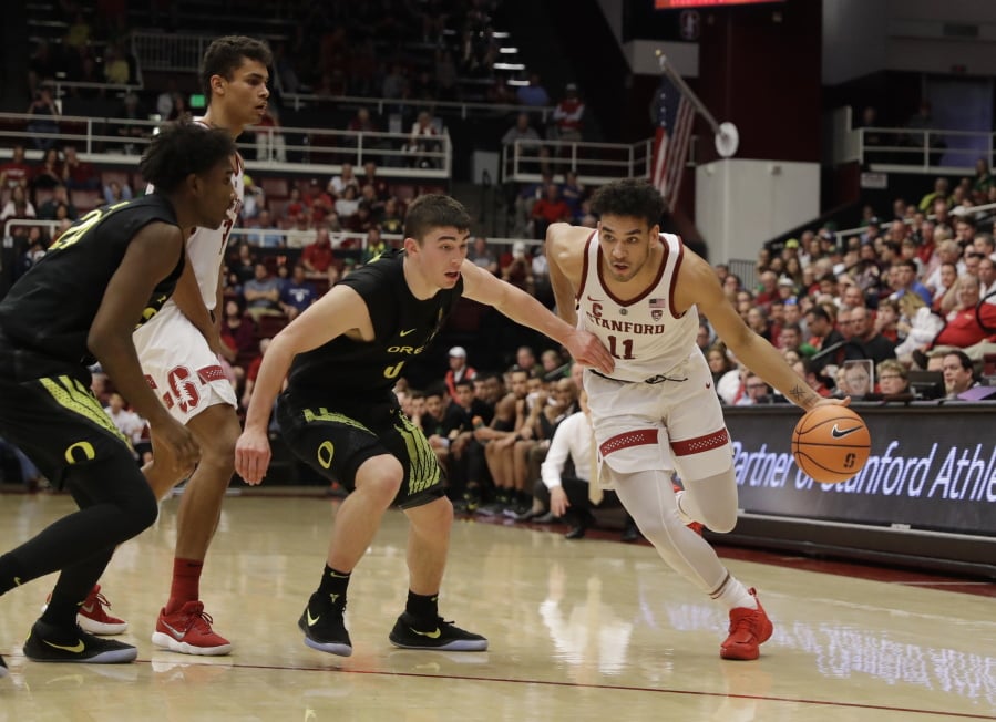 Stanford guard Dorian Pickens (11) dribbles against Oregon during the second half of an NCAA college basketball game Saturday, Feb. 3, 2018, in Stanford, Calif.