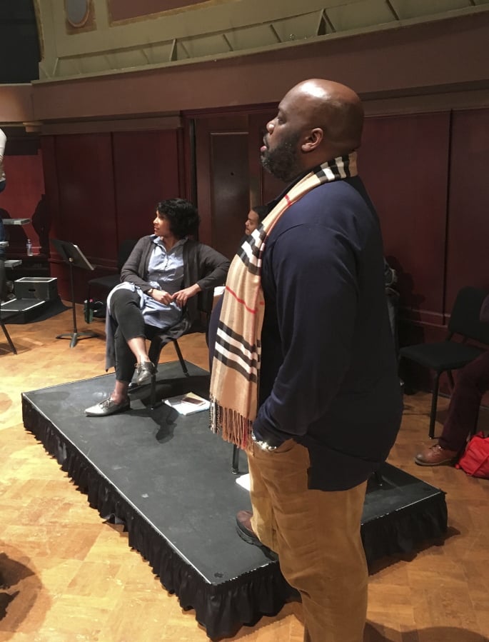 In this Feb. 13, 2018, photo, Morris Robinson, who plays Porgy, and Talise Trevigne, who plays the role of Bess, rehearse “The Gershwins’ Porgy and Bess” at the University of Michigan in Ann Arbor, Mich. A restored edition of the pioneering, enduring American opera gets a test-drive Saturday, Feb. 17 in Michigan en route to a planned, official debut in 2020 by the Metropolitan Opera in New York.