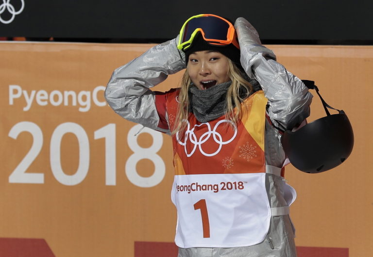 Chloe Kim, of the United States, reacts to her score during the women’s halfpipe finals at Phoenix Snow Park at the 2018 Winter Olympics in Pyeongchang, South Korea, Tuesday, Feb. 13, 2018.