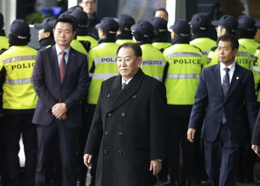 Kim Yong Chol, center, vice chairman of North Korea’s ruling Workers’ Party Central Committee, leaves to return to North Korea, at a hotel in Seoul, South Korea, on Tuesday. The North Korean envoy making a rare visit to South Korea said Sunday that his country was willing to open talks with the United States, a rare step toward diplomacy between enemies after a year of North Korean missile and nuclear tests and direct threats of war from both Pyongyang and Washington.