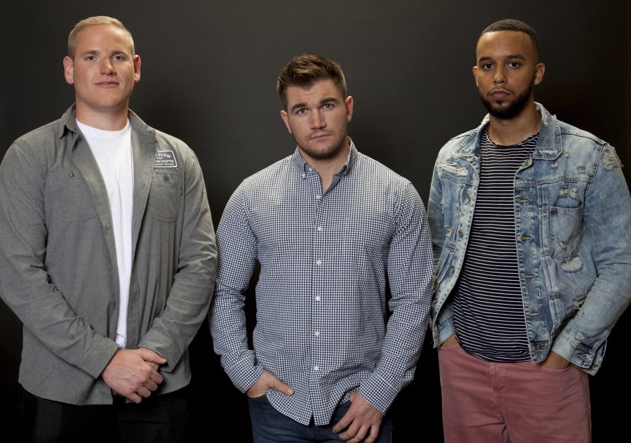 Spencer Stone, from left, Alek Skarlatos and Anthony Sadler, who famously thwarted a potential terrorist attack in August 2015 on a Paris-bound train, play themselves in “The 15:17 to Paris.” Rebecca Cabage/Invision