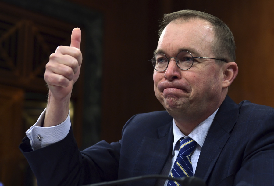 In this Feb. 13, 2018, photo, budget director Mick Mulvaney testifies before the Senate Budget Committee on Capitol Hill in Washington. The Trump administration is pushing a “bold new approach to nutrition assistance: “ Replacing the traditional cash on a card that food stamp recipients currently get with a pre-assembled box of canned foods and other shelf-stable goods dubbed “America’s Harvest Box.” Mulvaney likened the box to a meal kit delivery service, and said the plan could save nearly $130 billion over ten years. The idea, tucked into President Donald Trump’s 2019 budget, has caused a firestorm, prompting scathing criticism from Democrats and food insecurity experts who say its primary purpose is to punish the poor.