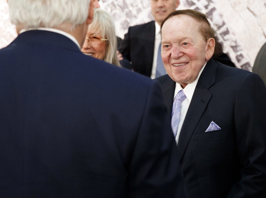Sheldon Adelson, right, talks with Secretary of State, Rex Tillerson, before a speech by President Donald Trump at the Israel Museum in Jerusalem. Adelson has proposed paying for at least part of the new U.S. embassy in Jerusalem, four U.S. officials told The Associated Press, and the Trump administration is considering the offer. Lawyers at the State Department are looking into the legality of the highly unconventional proposal to cover part or all of the embassy’s costs through private donations, the administration officials said.