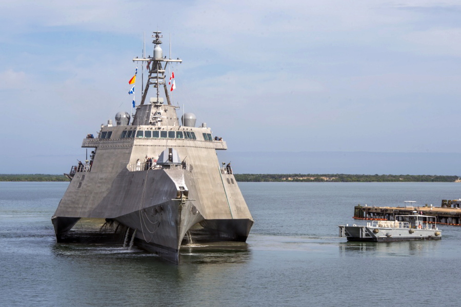 A Naval Station vessel, right, prepares to assist the future USS Omaha (LCS 12), a 218-foot-long littoral combat ship, pier side Jan. 3 during a brief fuel stop in Guantanamo Bay, Cuba. The Omaha was conducting a change of homeport to San Diego, Calif. (Mass Communication Specialist 1st Class John Philip Wagner, Jr./U.S.