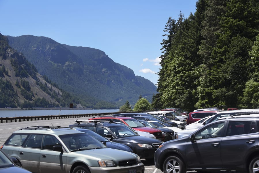 Dog Mountain, one of the most popular hiking areas in the Columbia River Gorge National Scenic Area, especially during wildflower season, and the trailhead parking lot fills up quickly, as seen here in a photo from May. To curb vehicles parking on state Highway 14, the U.S. Forest Service is going to require hikers to have permits starting this spring and extending into early summer.