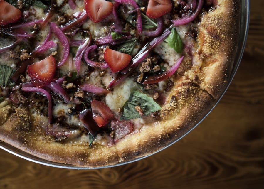 Not the ’90s: Mt. Tabor’s Strawberry Fields wood-fired pizza topped with feta, bacon, basil, balsamic reduction, candied pecans and pickled red onions.
