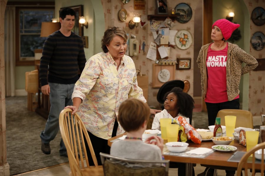 Roseanne finds herself at political odds with her sister, Jackie (Laurie Metcalf, right) in the rebooted “Roseanne,” which premiered March 27 on ABC.