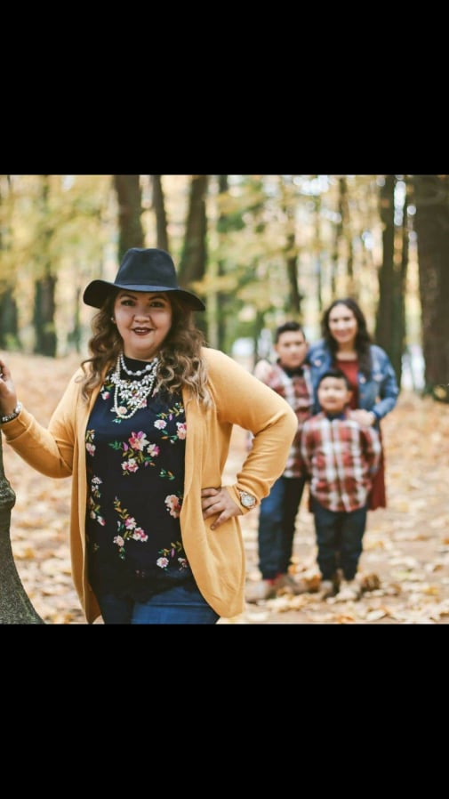 Luz Guitron, 35, with her three children in the background. Camas police say Guitron was found dead Sunday in a home in which there were signs of a struggle. Police say Guitron’s boyfriend is a suspect in her death.