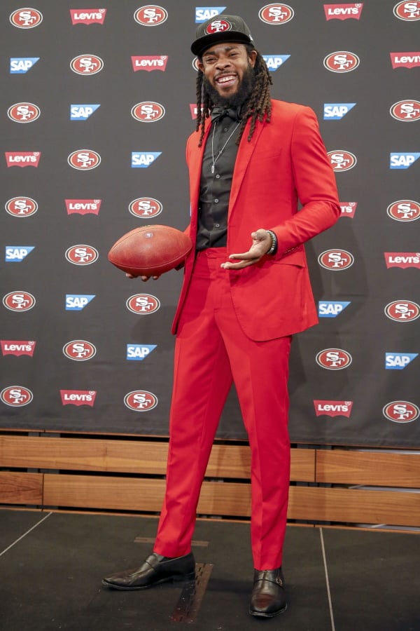 San Francisco 49ers new cornerback Richard Sherman poses for a photo after answering questions during an NFL football news conference in Santa Clara, Calif., Tuesday, March 20, 2018. Sherman agreed to a three-year deal with the 49ers.