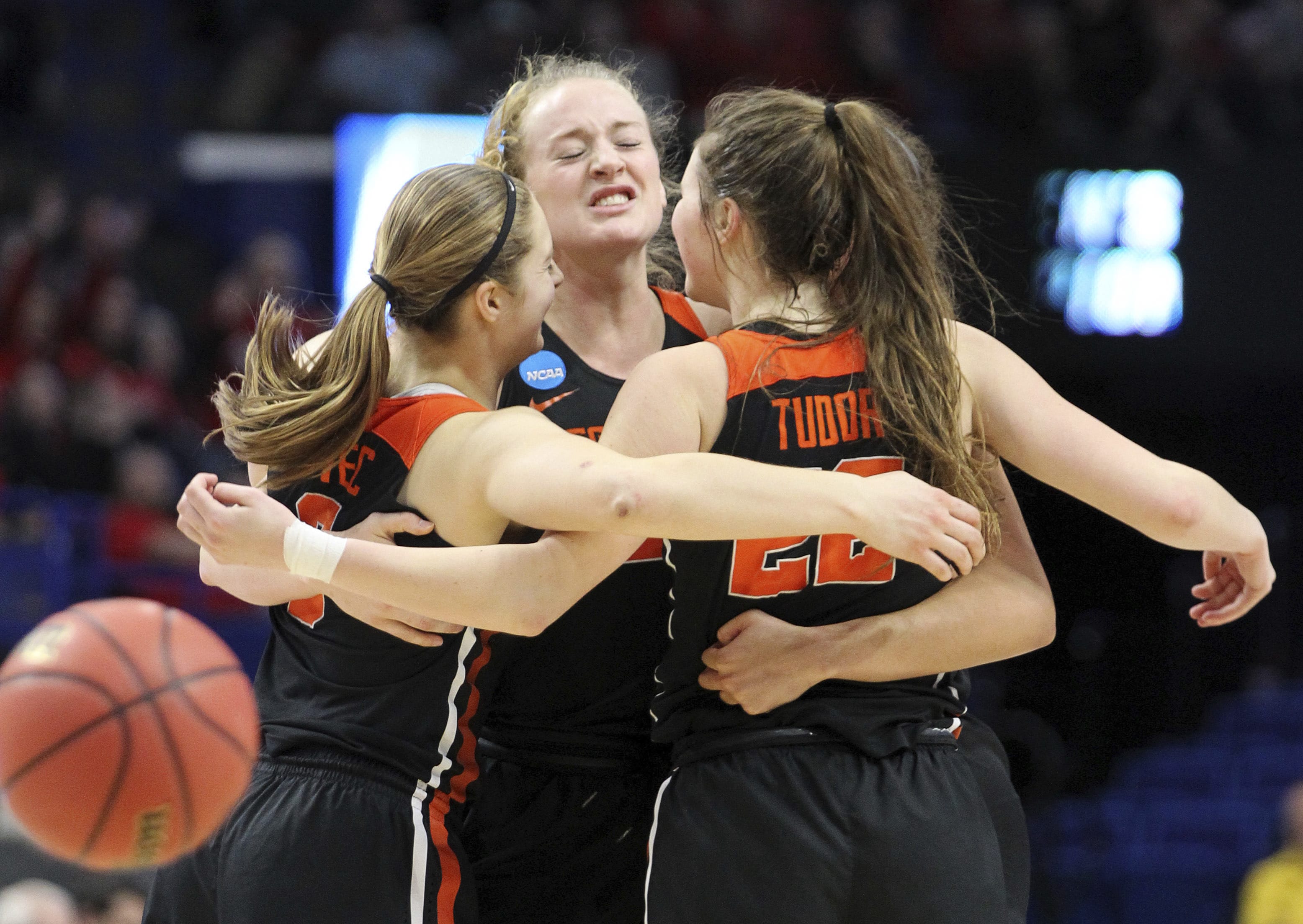 Oregon State's Mikayla Pivec, Marie Gulich and Kat Tudor, from left, celebrate after Oregon upset Baylor in an NCAA women's college basketball tournament regional semifinal Friday, March 23, 2018, in Lexington, Ky.