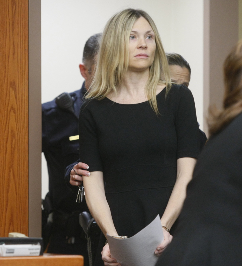 FILE - This Feb. 14, 2013 file photo shows Amy Locane Bovenizer entering the courtroom to be sentenced in Somerville, N.J. for the 2010 drunk driving accident in Montgomery Township that killed 60-year-old Helene Seeman The actress, who served about two-and-a-half years of a three-year sentence, must return to court for a second re-sentencing.