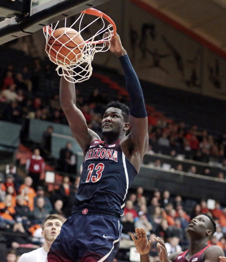 Arizona’s Deandre Ayton (13) was selected to the AP All-Pac-12 team on Tuesday, March 6, 2018. (AP Photo/Timothy J.