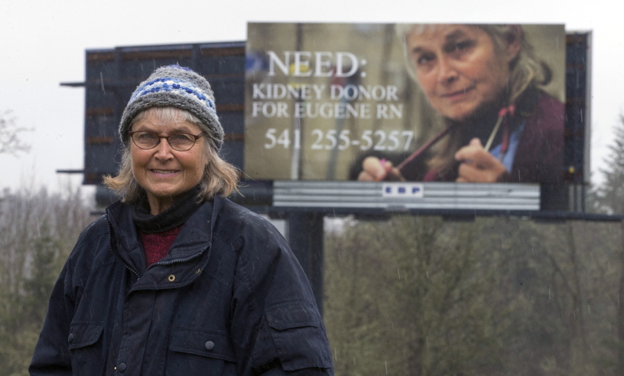 Roxanne Loomis is a Eugene, Ore., nurse is shown in a February 2017 file photo with one of the billboards she rented on Interstate 5 south of the Willamette Valley city in hopes of getting a kidney.