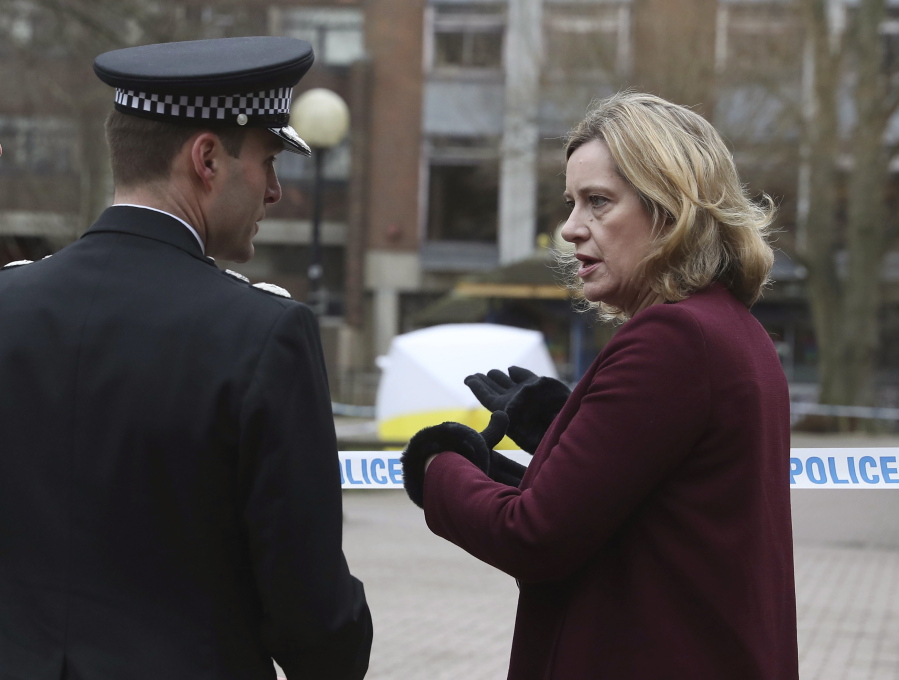 Britain’s Home Secretary Amber Rudd talks with Wiltshire Police Assistant Chief Constable Kier Pritchard during a visit to the scene at the Maltings shopping centre in Salisbury where former Russian double agent Sergei Skripal and his daughter were found critically ill after exposure to a nerve agent, Friday March 9, 2018.