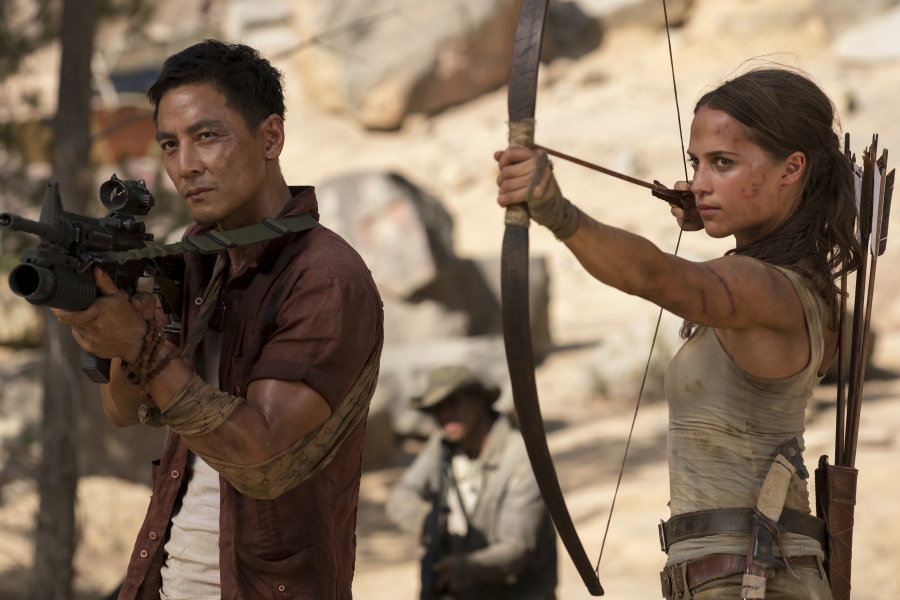 Daniel Wu, left, and Alicia Vikander star in “Tomb Raider.” Ilze Kitshoff/Warner Bros.
