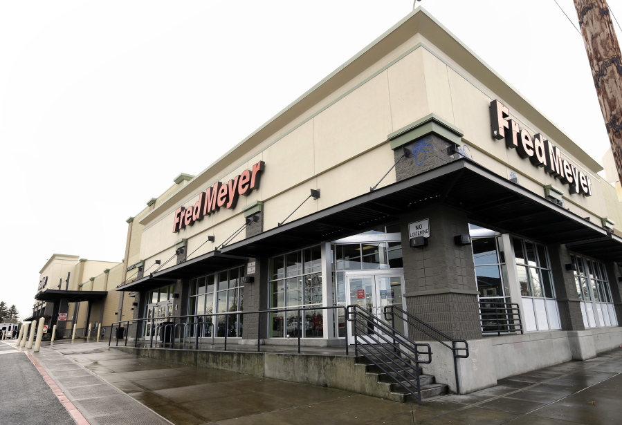 FILE - This March 1, 2018 file photo shows a Fred Meyer store is shown in Portland, Ore., Thursday, March 1, 2018. The Superstore company says it will stop selling guns and ammunition. The Portland, Oregon,-based chain in an announcement Friday, March 16 says it made the decision after evaluating customer preferences. The company has more than 130 stores in Oregon, Washington, Idaho and Alaska.