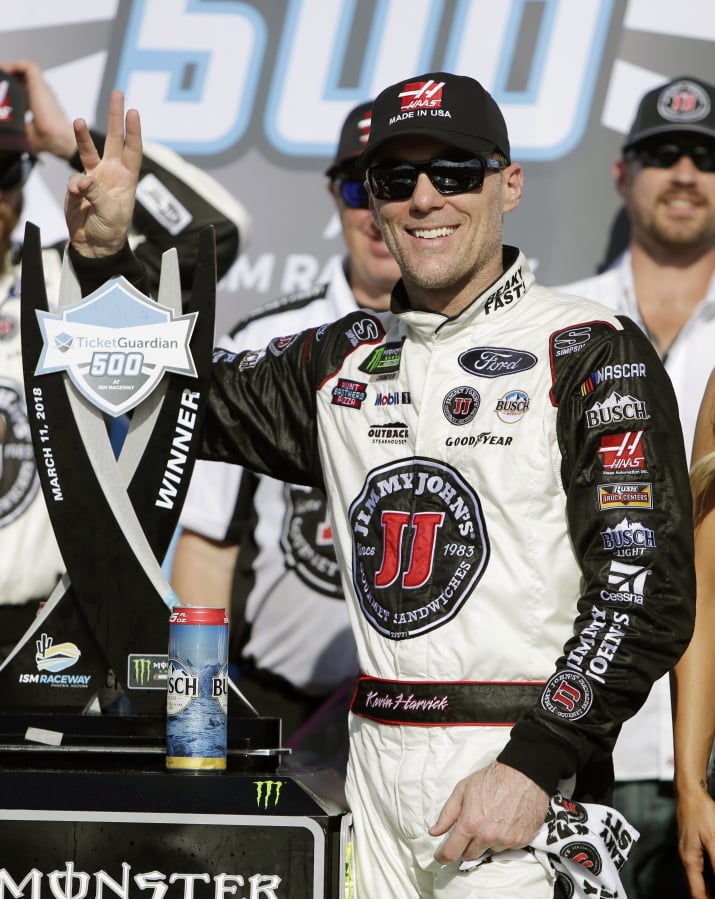 Monster Energy NASCAR Cup Series driver Kevin Harvick (4) holds up three fingers after winning his third race this season during the NASCAR Cup Series on Sunday, March 11, 2018, in Avondale, Ariz.