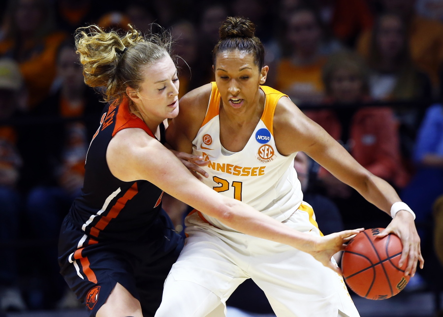 Oregon State center Marie Gulich, left, knocks the ball away Tennessee center Mercedes Russell, right, in the first half of a second-round game in the NCAA college basketball tournament Sunday, March 18, 2018, in Knoxville, Tenn.