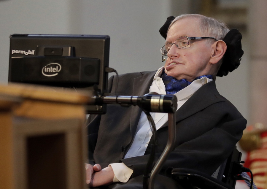Britain’s Professor Stephen Hawking delivers a keynote speech as he receives the Honorary Freedom of the City of London during a ceremony at the Guildhall in the City of London. Hawking, whose brilliant mind ranged across time and space though his body was paralyzed by disease, has died, a family spokesman said early Wednesday, March 14, 2018.