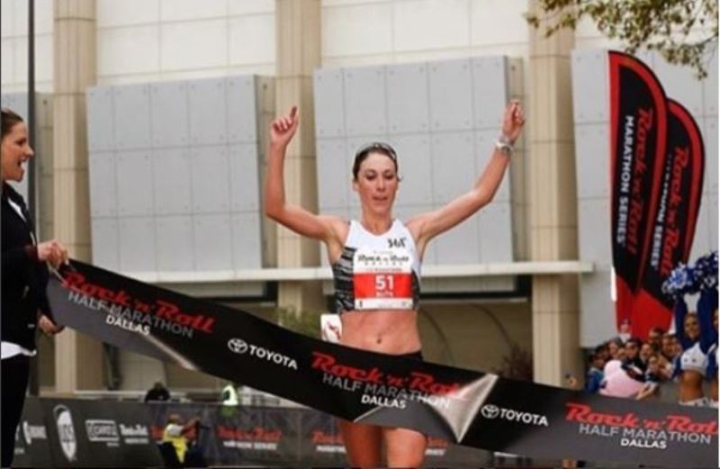 Sarah Crouch crosses the finish line to win the Rock 'n' Roll Half Marathon on Sunday, March 25, 2018 at Dallas. It was the Hockinson native's second consecutive Rock 'n' Roll half marathon victory, having won at New Orleans in February.