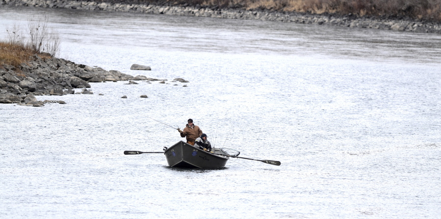 Fishermen have the Clearwater River to themselves on Feb. 4, 2014, in Lewiston, Idaho. Fisheries managers should shut down steelhead fishing in the Columbia and Snake river basins to protect a wild run that returns to Idaho’s Clearwater River, according to a conservation group.