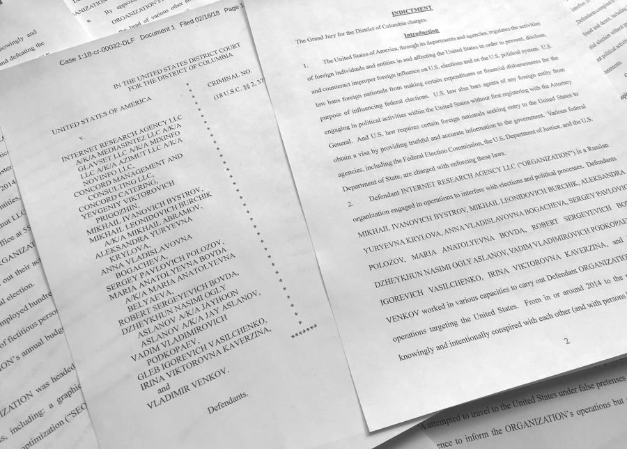 In this March 15, 2018, photo, a portion of the Feb. 16, indictment against Russia’s Internet Research Agency is photographed in Washington. In its toughest challenge to Russia to date, the Trump administration accused Moscow of an elaborate plot to penetrate America’s electric grid, factories, water supply and even air travel through cyber hacking. The U.S. also hit targeted Russians with sanctions for alleged election-meddling for the first time since President Donald Trump took office. The list of Russians being punished included all 13 indicted last month by special counsel Robert Mueller, a tacit acknowledgement by the Trump administration that Mueller’s Russia-related probe has merit.