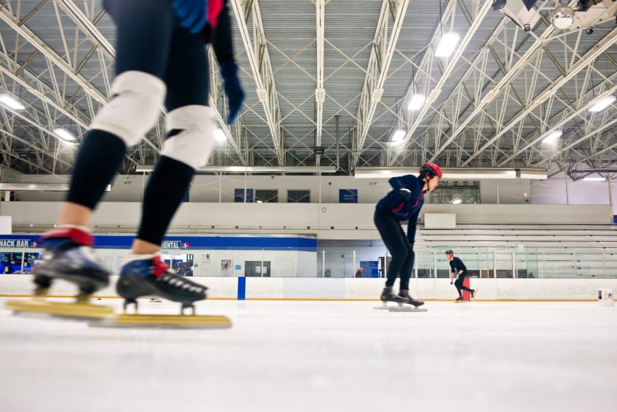 Speed skaters circle the rink during practice at Mountain View Ice Arena in March 2017.