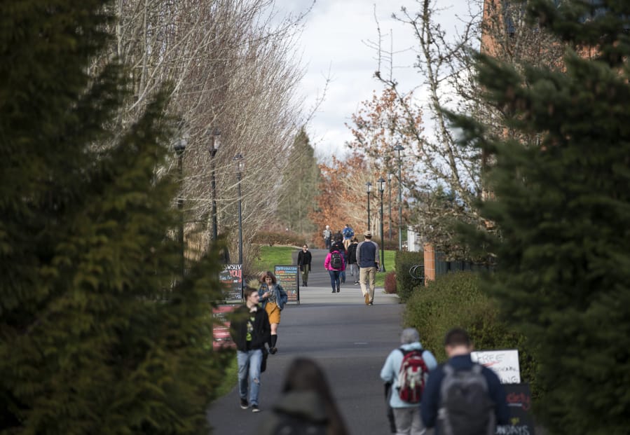 Students walk between classes at Washington State University Vancouver on Feb. 6.