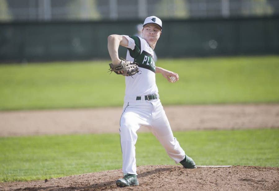 Evergreen senior Tommy Snyder pitches during a game against Mountain View High School, Monday April 9, 2018, at Evergreen High School.