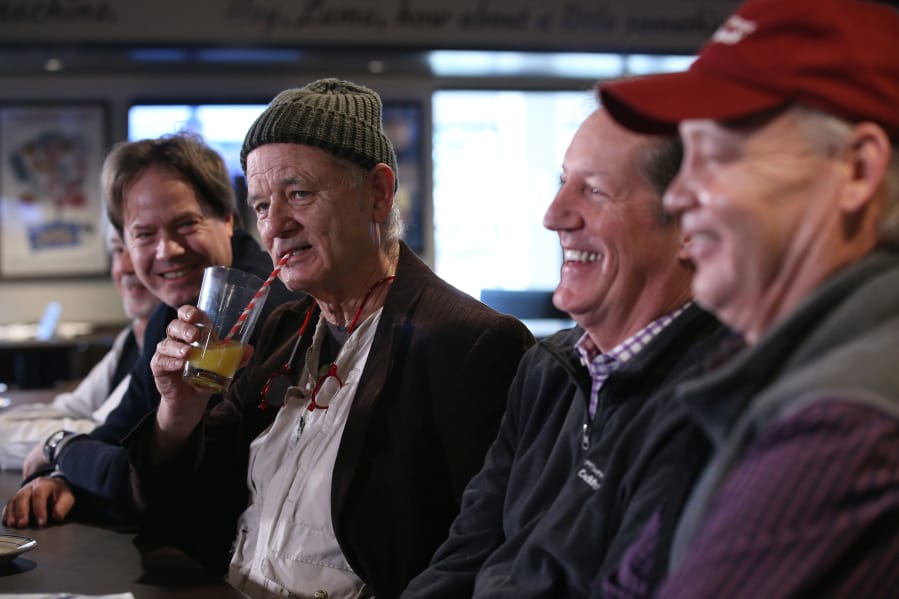 Actor and comedian Bill Murray speaks to the media while mentioning that they would have paper straws at Caddyshack restaurant on Tuesday in Rosemont, Ill.