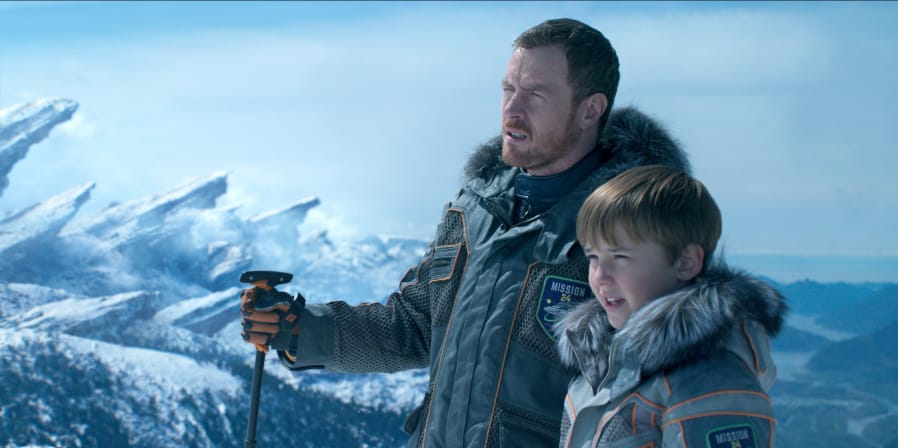 Toby Stephens, left, and Maxwell Jenkins star in “Lost in Space.” Netflix