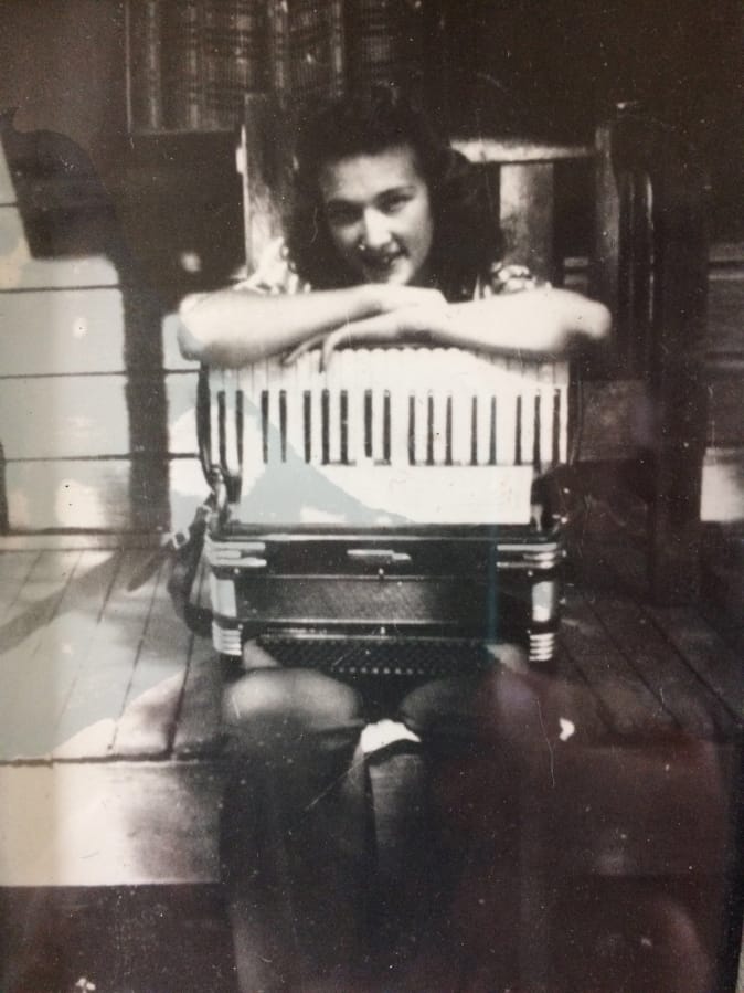 Accordionist Lillian Sedar at age 14 or so. “We kids would roll our eyes,” writes her daughter, Lynne Broms Schroeder, but nowadays they’d do anything to hear Mom’s accordion one more time.