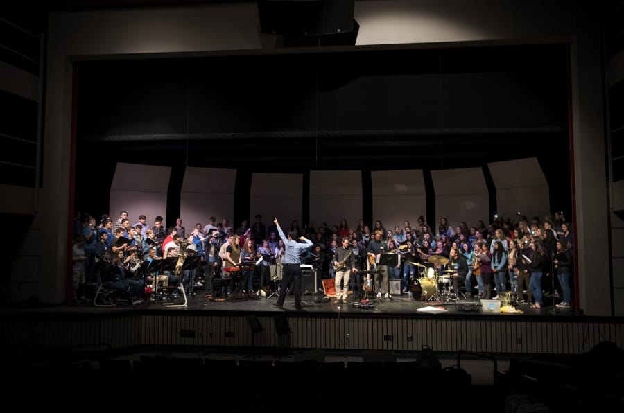 Rock band Bright Moments and the Camas High School Choir combine forces during a rehearsal March 26 ahead of a joint concert tonight at the Portland Institute for Contemporary Art.