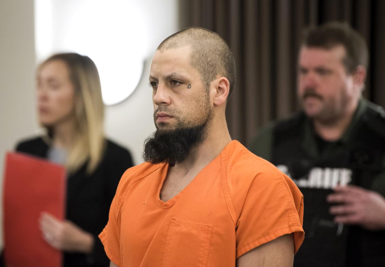 Brad Lee Reeves makes a first appearance Friday in Clark County Superior Court, after prompting an hourslong manhunt Thursday night in which two Vancouver police officers fired their weapons.