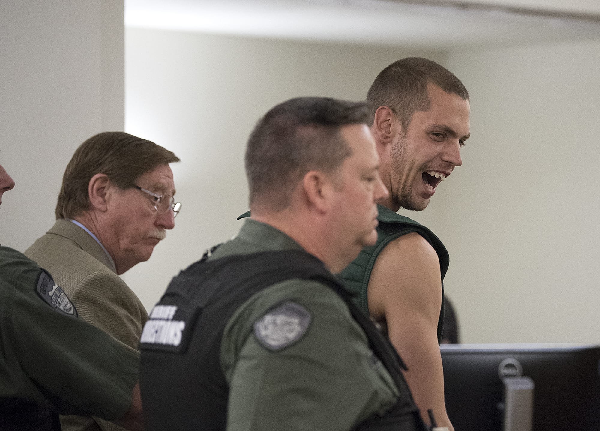 Zakary French, 24, right, makes a first appearance on suspicion of first-degree assault in Clark County Superior Court on Thursday morning, April 12, 2018. French is accused of stabbing his 69-year-old grandfather in the neck Wednesday.