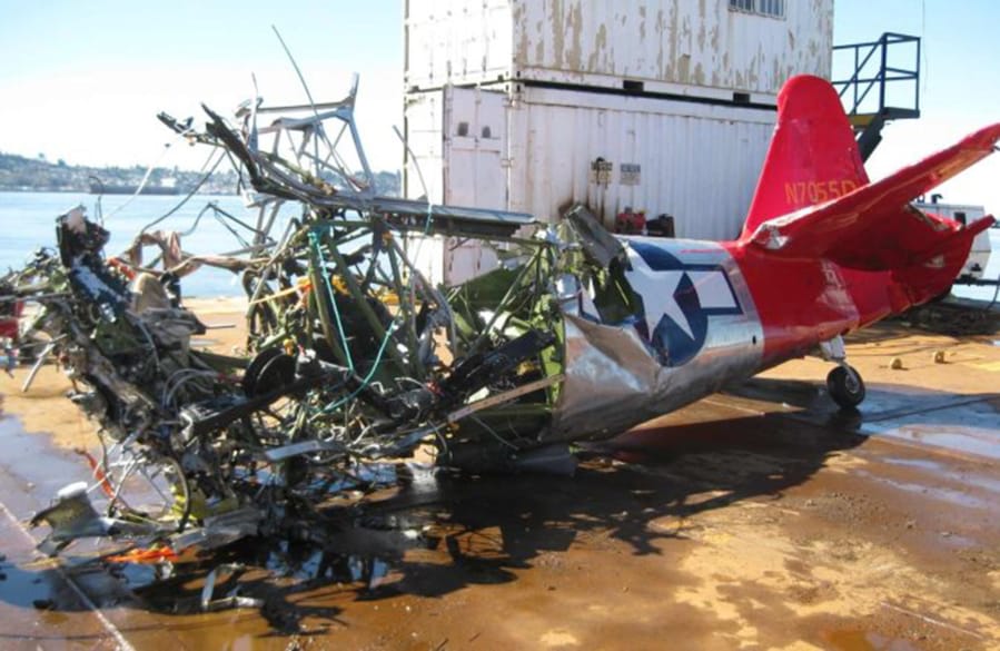 The wreckage of Vancouver pilot and leader John McKibbin’s WWII-era military trainer after it was pulled from the Columbia River following the crash that killed him and a passenger, Irene Mustain, in March 2016. An investigation found that the most likely cause of the crash was a medical problem with McKibbin.