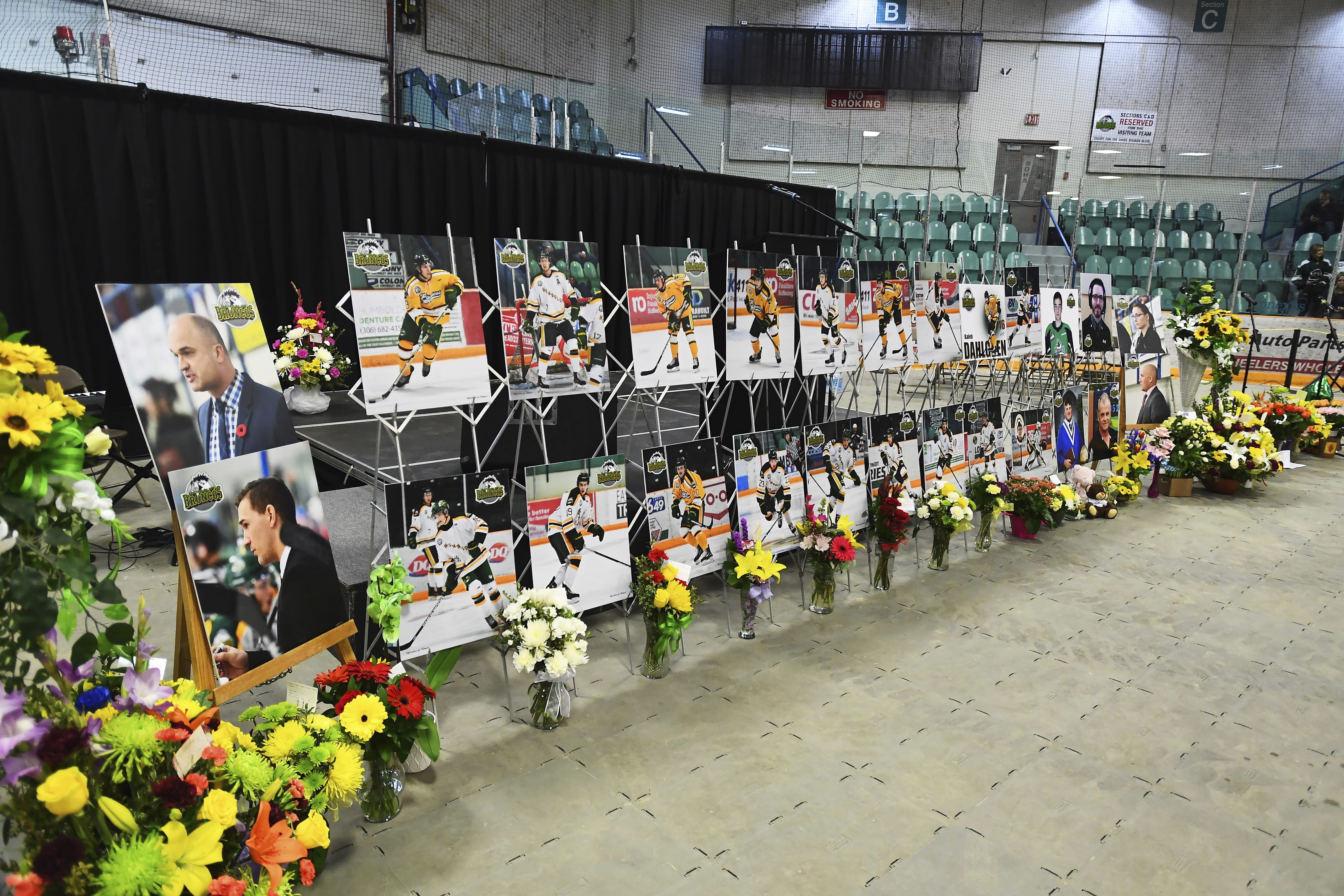 Photos of people involved in a fatal bus crash are seen prior to a vigil at the Elgar Petersen Arena, home of the Humboldt Broncos, in Humboldt, Saskatchewan on Sunday, April 8, 2018.