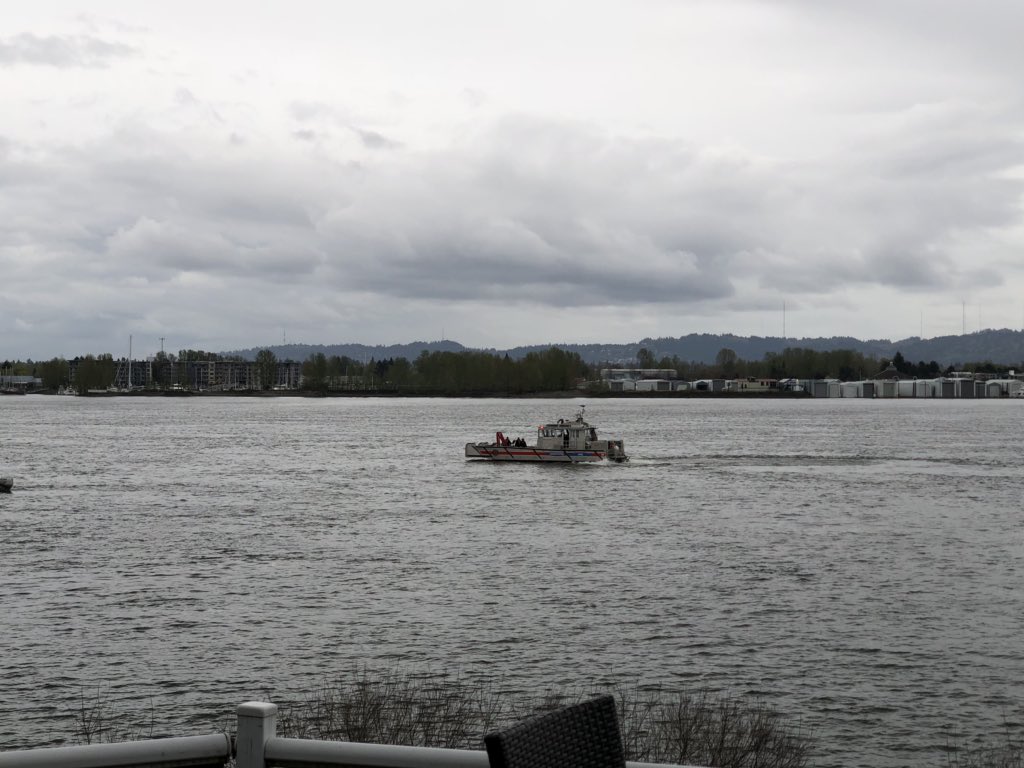 First responders retrieve a body Friday evening from the Columbia River, following a 911 caller's report of a drowning near McMenamins Vancouver on the Columbia.
