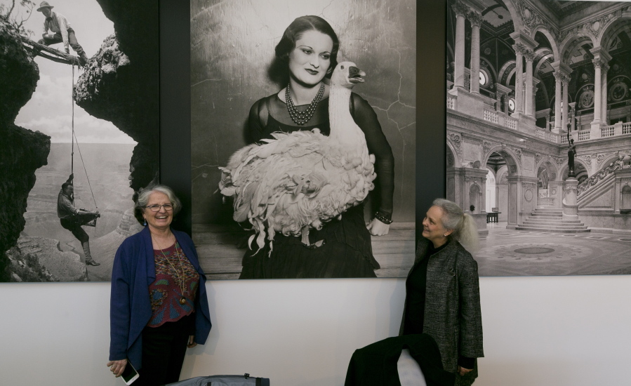 Exhibition curator Anne Wilkes Tucker, left, and Library of Congress photo curator Beverly Brannan, right, are pictured Thursday during a media preview of the exhibit “Not An Ostrich: And Other Images From America’s Library” at the Annenberg Space For Photography in Los Angeles.