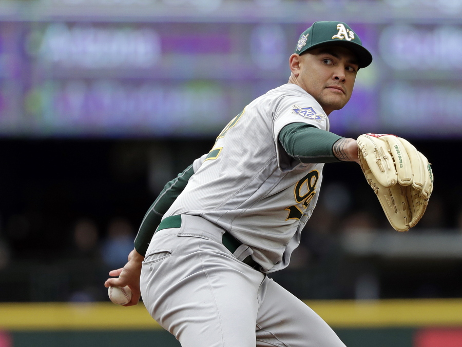 Oakland Athletics starting pitcher Sean Manaea throws against the Seattle Mariners in the second inning during a baseball game Sunday, April 15, 2018, in Seattle.