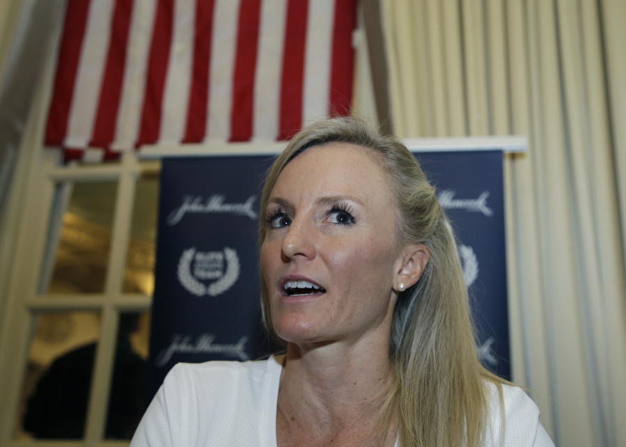 Elite U.S. runner Shalane Flanagan speaks to reporters, Friday, April 13, 2018, in Boston. The 122nd running of the Boston Marathon is scheduled for Monday.