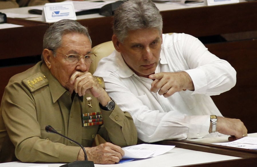 Cuba’s President Raul Castro, left, and Vice President Miguel Diaz-Canel Bermudez attend the opening of a two-day, twice-annual legislative sessions, at the National Assembly in Havana, Cuba, in 2013. Diaz-Canel, 57, is widely expected to take Castro’s place as Cuba’s next president on April 19.