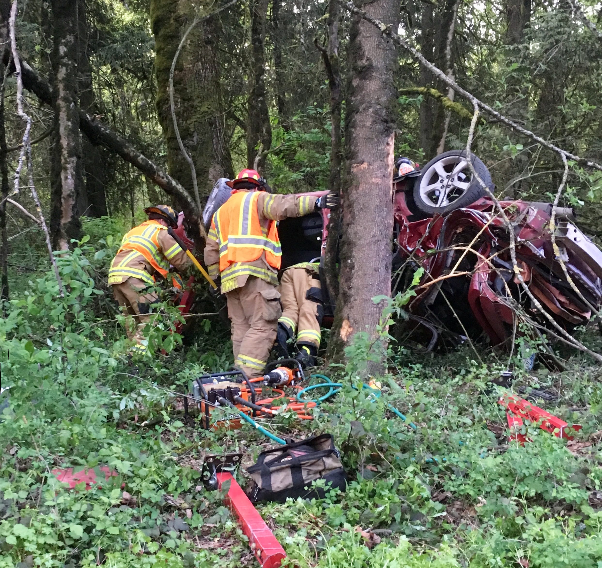 Firefighters with Clark County Fire & Rescue had to carefully remove a man who was pinned in his car after veering off I-5 and crashing into a tree.