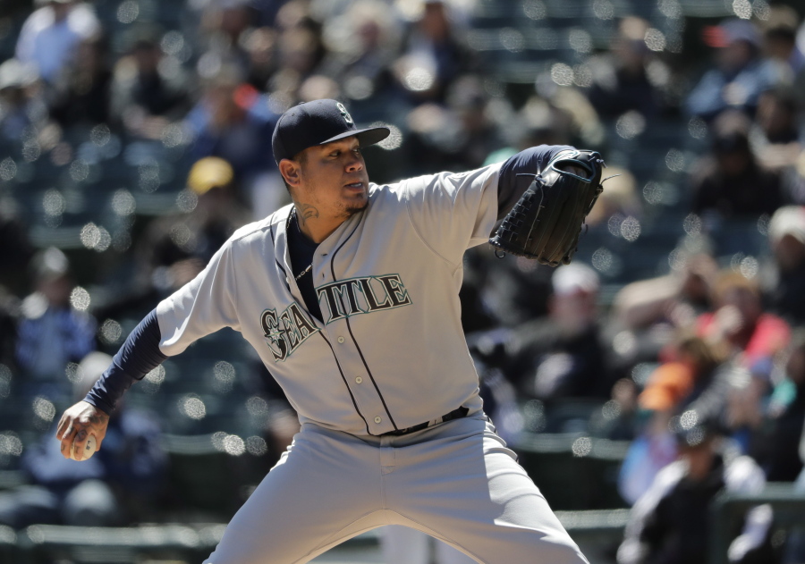 Seattle Mariners starting pitcher Felix Hernandez delivers during the first inning of a baseball game against the Chicago White Sox Wednesday, April 25, 2018, in Chicago.
