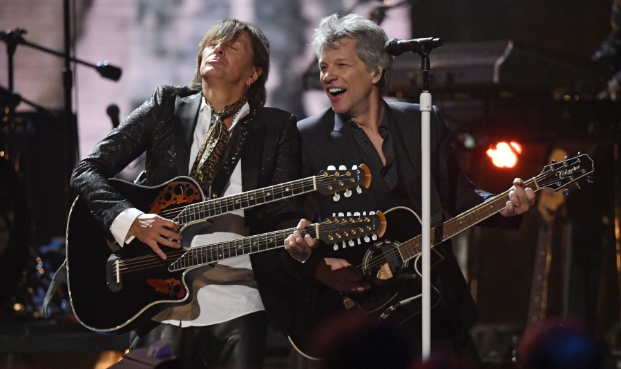 Richie Sambora, left, and Jon Bon Jovi perform during the Rock and Roll Hall of Fame induction ceremony Saturday in Cleveland.