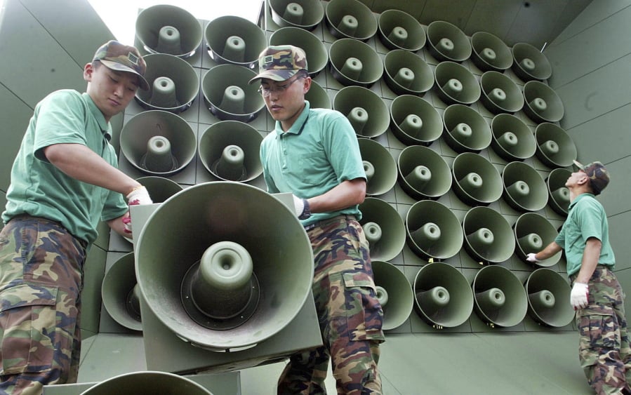 South Korean army soldiers remove loudspeakers used for propaganda near the demilitarized zone between South and North Korea, in Paju, South Korea. South Korea says it will remove propaganda-broadcasting loudspeakers from the tense border with North Korea. The announcement came three days after the leaders of the two Koreas agreed to work together to achieve a nuclear-free Korean Peninsula and end hostile acts against each other along their border during their rare summit talks. Seoul’s Defense Ministry said Monday, April 30, 2018, it will pull back dozens of its frontline loudspeakers on Tuesday.