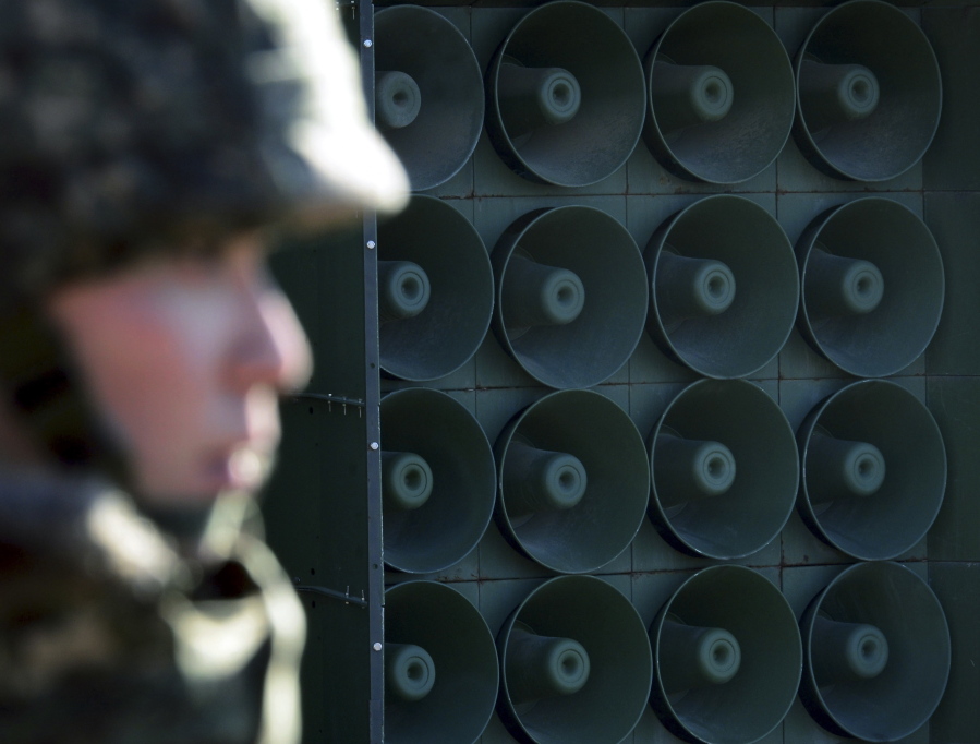 A South Korean soldier stands near the loudspeakers near the border area between South Korea and North Korea in Yeoncheon, South Korea. South Korea says it has halted anti-Pyongyang propaganda broadcasts on the border ahead of the April 27, 2018, inter-Korean talks. The South’s Defense Ministry says it turned off loudspeaker broadcasts Monday, April 23, to try to ease military tensions and establish an environment for peaceful talks.