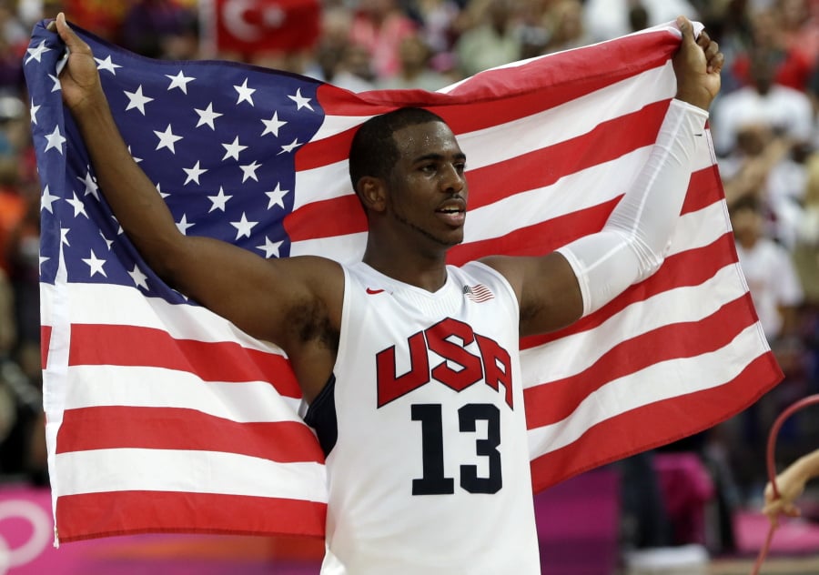 Chris Paul celebrates after the men’s gold medal basketball game at the 2012 Summer Olympics, in London. LeBron James is putting himself in position to play in a fourth Olympics, and Kevin Durant and Chris Paul a third.