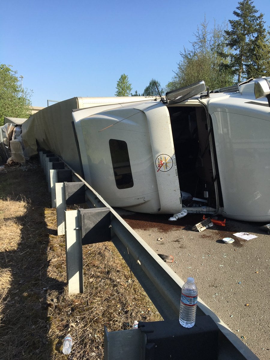 A tractor-trailer rolled onto its side on I-205 southbound Thursday morning in the Salmon Creek area.