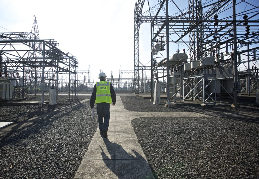 Bonneville Power Administration Principal Structural Engineer Leon Kempner walks through Ross Complex in Vancouver.